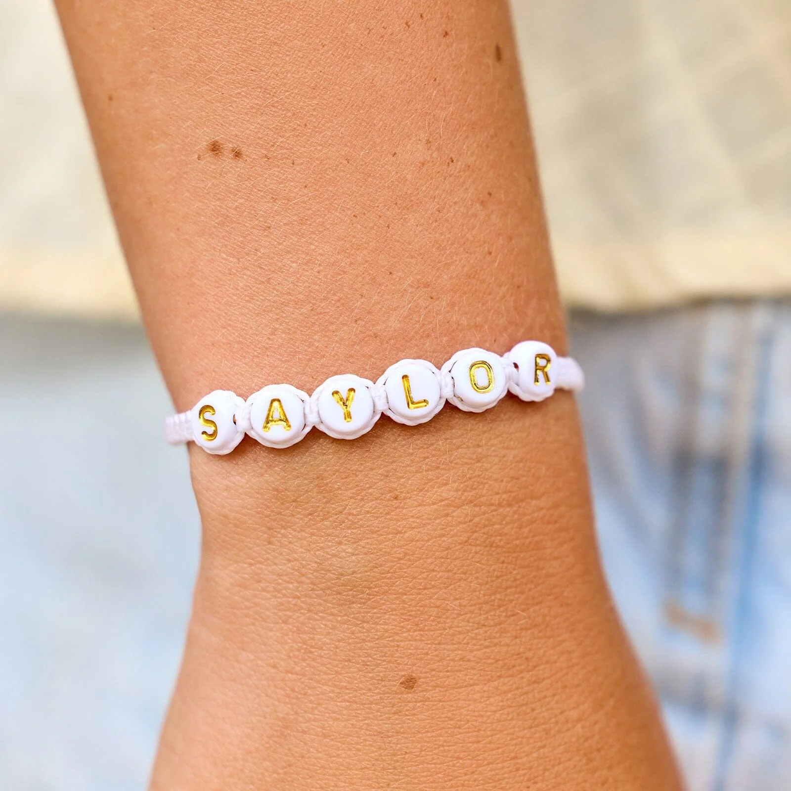 White Alphabet Bead Bracelet - Image 2